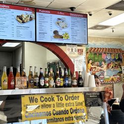 Pupuseria La Sierra Restaurant - Salsa bar , alcohol and menu