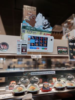 Kura Revolving Sushi Bar by null