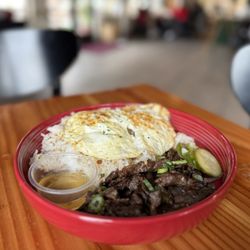 Tapsilog (grilled marinated steak, garlic fried rice and two fried eggs)