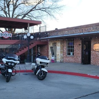 Creekside Cigar - two motorcycles parked in front of a brick building - Cigar Bars Near Me - Belton, Texas
