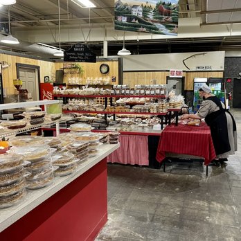 Beccas Bakery - a woman standing in front of a display of baked goods - Bakeries Near Me - Flemington, New Jersey