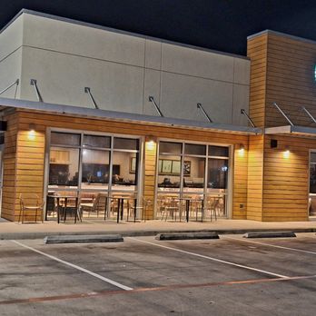 Starbucks - This is the exterior of this Starbucks, with its patio the left, taken from within the Las Palmas Shopping Center in the evening - Coffee & Tea Near Me - Port Isabel, Texas Starbucks - This is the exterior of this Starbucks, with its patio the left, taken from within the Las Palmas Shopping Center in the evening - Coffee & Tea Near Me - Port Isabel, Texas