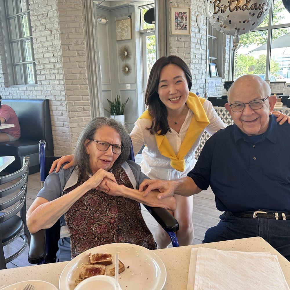 Eggsquisite Cafe - Eileen, the owner celebrating my stepdad on his 81st birthday with a beautiful coffee cake. - Breakfast & Brunch Near Me - Frisco, Texas