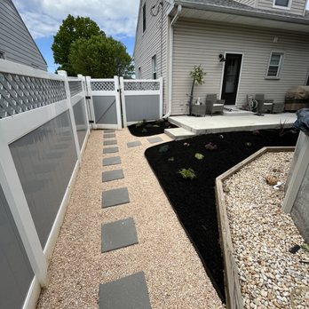 Quality Lawn & Landscape - Stepping stone walkway - Lawn Services Near Me Quality Lawn & Landscape - Stepping stone walkway - Lawn Services Near Me