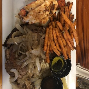 Captain John's Restaurant & Tiki Bar - Lobster tail and prime rib - American Near Me - Sylvan Beach, New York Captain John's Restaurant & Tiki Bar - Lobster tail and prime rib - American Near Me - Sylvan Beach, New York