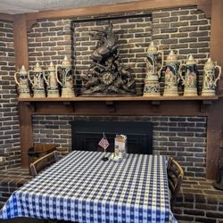 Ox Yoke Inn - Steins and stag on the fireplace