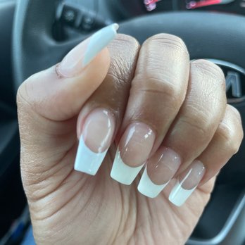 Sodo Nail Lash Bar - Pointer finger is a brighter white other three fingers yellow white - Eyelash Service Near Me - Orlando, Florida