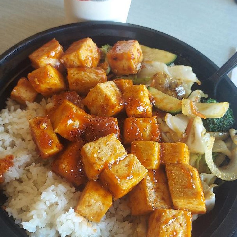 Spicy tofu - lite, tasty, expertly prepared, over rice and veggies. Huge portion is enough for another meal---or two!