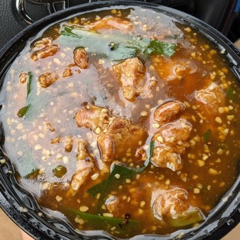 Hakka Hut - Spice garlic chicken. It's packed so full. Look at the garlic! - Chinese Near Me - Cambridge, Ontario Hakka Hut - Spice garlic chicken. It's packed so full. Look at the garlic! - Chinese Near Me - Cambridge, Ontario