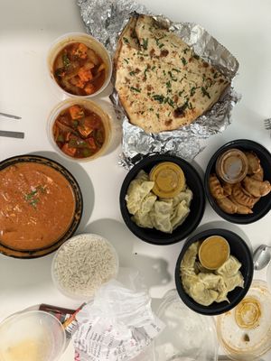 Bombay to Kathmandu Kitchen,Curry Pizza and bar by null