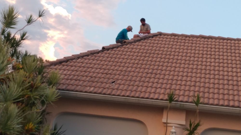 Slide of A Manos Roofing