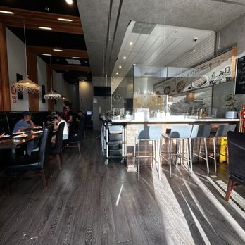 Dumpling 85 - Inside restaurant with ladies making soup dumplings behind glass window - Shanghainese Near Me - San Ramon, California Dumpling 85 - Inside restaurant with ladies making soup dumplings behind glass window - Shanghainese Near Me - San Ramon, California