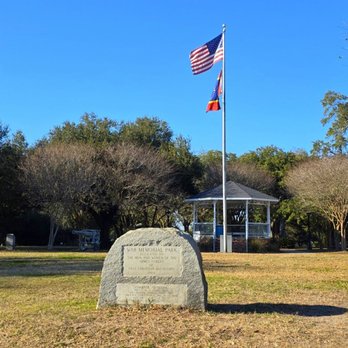 War Memorial Park - War Memorial Park monument and flag view. - Parks Near Me - Pass Christian, Mississippi War Memorial Park - War Memorial Park monument and flag view. - Parks Near Me - Pass Christian, Mississippi