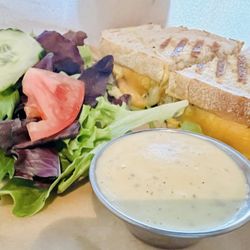 Eat Real Cafe - Sourdough bread grilled cheese with pesto