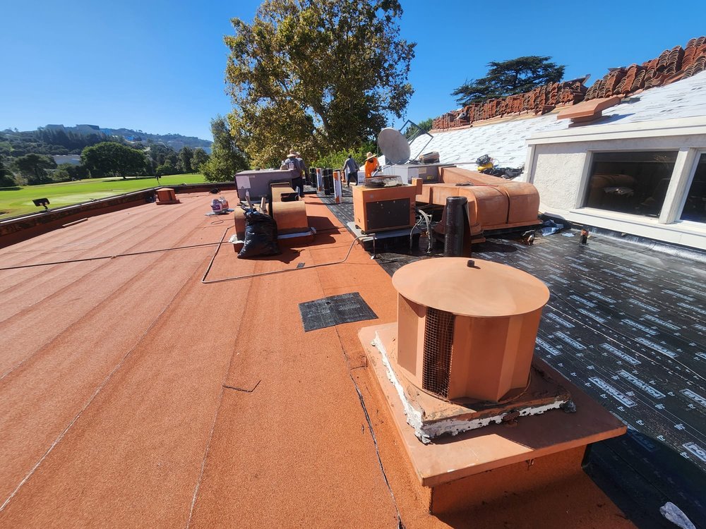 Slide of iHeart Roofing