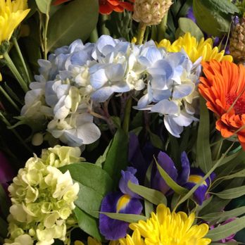 The Flower Bucket - They offer these mini pineapples to the flowers! Great touch ! - Florists Near Me - Austin, Texas The Flower Bucket - They offer these mini pineapples to the flowers! Great touch ! - Florists Near Me - Austin, Texas