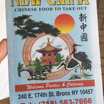 New China - a hand holding a menu for a restaurant - Chinese Near Me - Bronx, New York