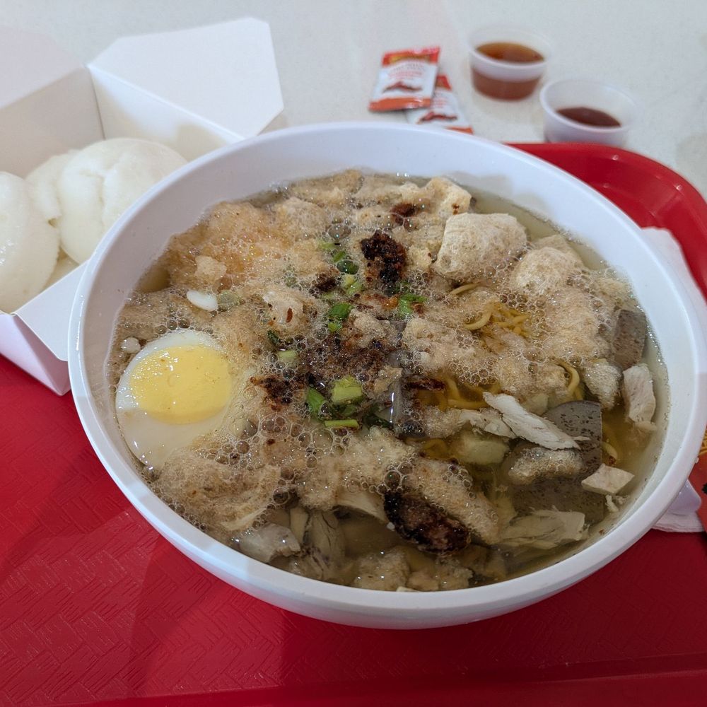 Original Batchoy with egg and Putos on the side. Original Batchoy with egg and Putos on the side.