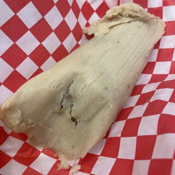Jenn's Hot Tamale - a partially eaten tamale - Food Trucks Near Me Jenn's Hot Tamale - a partially eaten tamale - Food Trucks Near Me