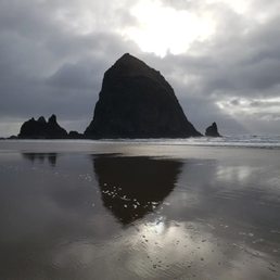 Breathtaking view of Haystack Rock. The tide was coming in. Breathtaking view of Haystack Rock. The tide was coming in.