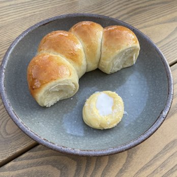 Ernest - Parker house rolls with butter and milk - New American Near Me - San Francisco, California