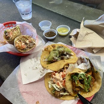 The Taco Stand - Mar y Tierra Burrito, Carne Asada Taco, Grilled Pescado Taco and Al Pastor Taco. All fire. - Food Stands Near Me - La Jolla, California