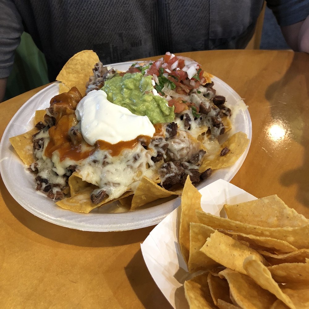 Fiesta Fresh Mexican Grill - a plate of nachos and chips - Mexican Near Me - Bluffton, South Carolina