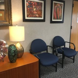 Wake Gastroenterology - Part of the waiting room: lots of cool art such as vases and photography!