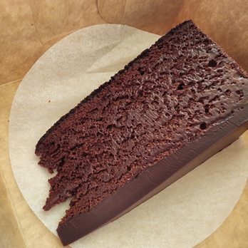 Tartine Bakery - Souffle Cake Slice@ $10.25 - Super decadent, basically like moist truffle filling - Bakeries Near Me - San Francisco, California Tartine Bakery - Souffle Cake Slice@ $10.25 - Super decadent, basically like moist truffle filling - Bakeries Near Me - San Francisco, California