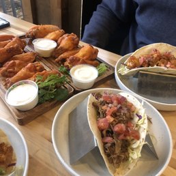 16 Bone-In Buffalo Wings, 1 pulled pork taco, and 1 bangin' chicken taco. 16 Bone-In Buffalo Wings, 1 pulled pork taco, and 1 bangin' chicken taco.