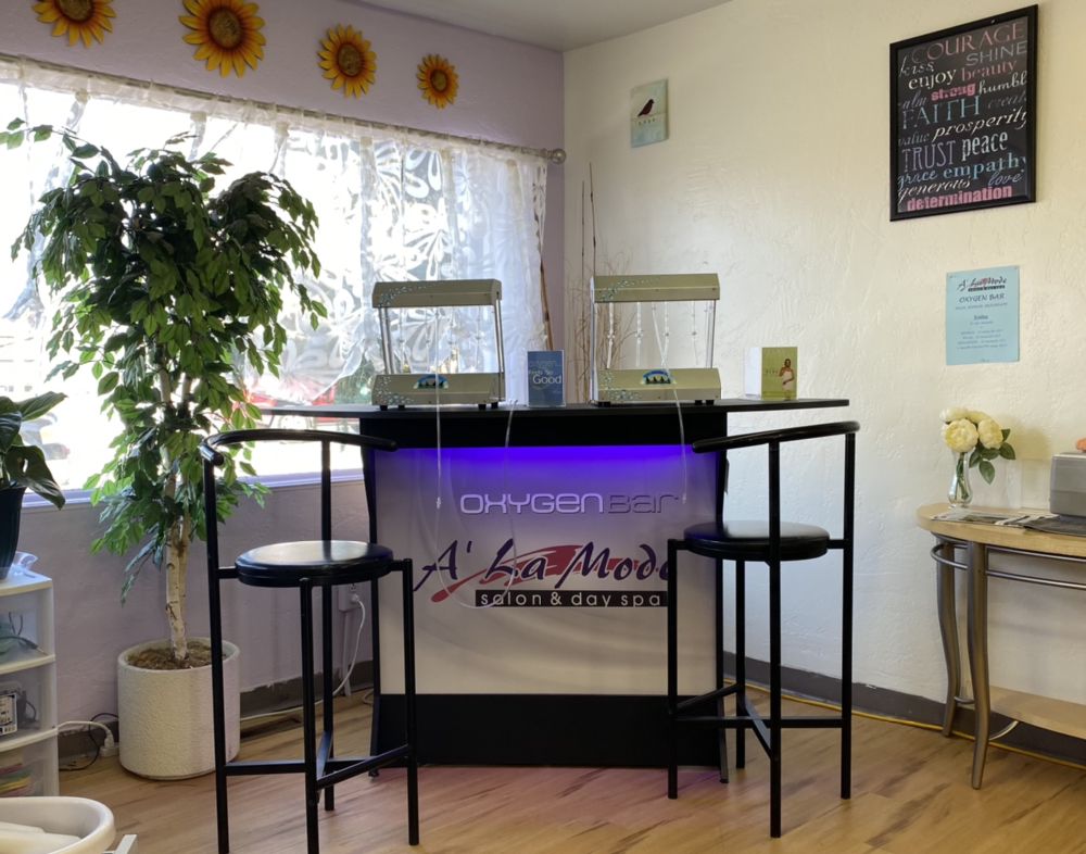 ALa Mode Salon & Day Spa Logo