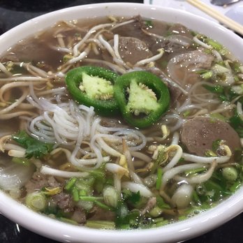IPHO - Beef Soup w/rare eye of round steak, brisket, beef flank, tendon, meat balls, fresh rice noodles, basil, bean sprouts, jalapeños & lime - Vietnamese Near Me - Bellevue, Nebraska IPHO - Beef Soup w/rare eye of round steak, brisket, beef flank, tendon, meat balls, fresh rice noodles, basil, bean sprouts, jalapeños & lime - Vietnamese Near Me - Bellevue, Nebraska