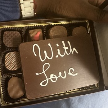 Le Chocolatier - a person holding a box of chocolates - Chocolatiers & Shops Near Me - North Miami Beach, Florida Le Chocolatier - a person holding a box of chocolates - Chocolatiers & Shops Near Me - North Miami Beach, Florida