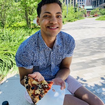 King Dough Indy - My husband enjoying a slice downtown on his birthday! - Pizza Near Me - Indianapolis, Indiana