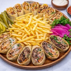 Capital Doner - I ordered the family mix platter and I was very impressed with portion and the size.  SHAWARMA Family SIZE! Mixed Grilled Chicken and Beef