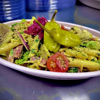 Sprout Kitchen - The Charpasta Bowl features salami, soppressata, parmesan, white cheddar, tomato, red onion, banana pepper, saffron aioli, lemon thyme vin - Salad Near Me - Eugene, Oregon