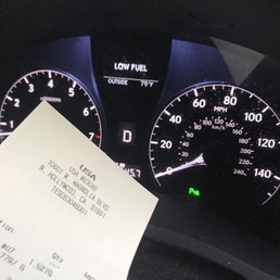 Receipt to show I paid a gallon and half and my low fuel still on! How can this be legal?! Receipt to show I paid a gallon and half and my low fuel still on! How can this be legal?!