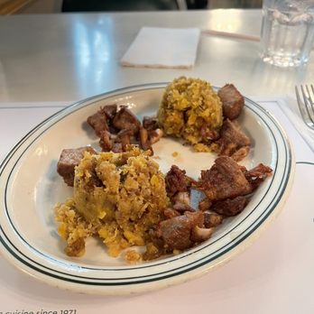 Versailles - Fufu con masitas. Mashed plantains with fried pork chunks - Cuban Near Me - Miami, Florida Versailles - Fufu con masitas. Mashed plantains with fried pork chunks - Cuban Near Me - Miami, Florida