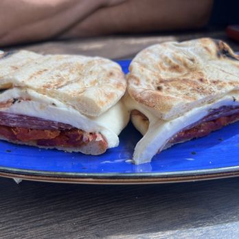 Royal Crown Bakery - Hot capicolo panini with mozzarella & sun dried tomatoes - Italian Near Me - Staten Island, New York Royal Crown Bakery - Hot capicolo panini with mozzarella & sun dried tomatoes - Italian Near Me - Staten Island, New York