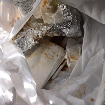 Carrillo's Mexican Food - Beans and rice spilled all over the bag due to carelessness by the person who packaged the food. - Mexican Near Me - Clovis, California