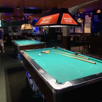 Tipperary Pub - Vintage decor with two pool tables. Beer storage underneath the tables too. - Irish Pub Near Me - Deerfield Beach, Florida