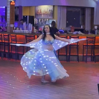 Simone Belly Dancing - Simone performing Isis Wings - Performing Arts Near Me Simone Belly Dancing - Simone performing Isis Wings - Performing Arts Near Me