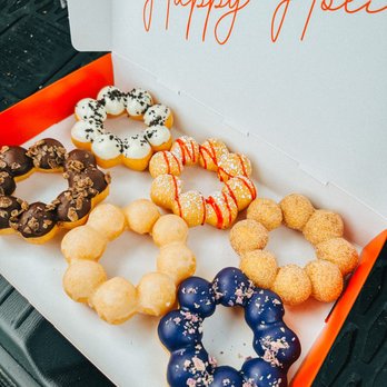 Mochinut - Half Dozen: Chocolate, Cookies & Cream, Original Glaze, Funnel Cake, Ube, and Cinnamon Sugar - Donuts Near Me - Lakewood, Washington Mochinut - Half Dozen: Chocolate, Cookies & Cream, Original Glaze, Funnel Cake, Ube, and Cinnamon Sugar - Donuts Near Me - Lakewood, Washington