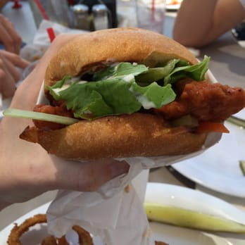 Schooner or Later - Buffalo chicken burger in a bun. Drizzle ranch all over it. - Sandwiches Near Me - Long Beach, California