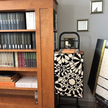 Millenia Flooring Design - a bookshelf with books and a chair - Carpeting Near Me - Toronto, Ontario Millenia Flooring Design - a bookshelf with books and a chair - Carpeting Near Me - Toronto, Ontario