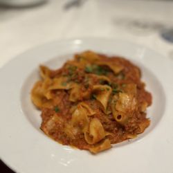 Juliet Social  - Bolognase made with pappadelle style pasta. Very generous servings!