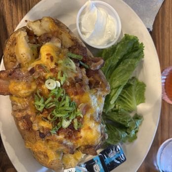 Press Box Grill - Loaded Baked Potato with Brisket. - Sports Bars Near Me - Dallas, Texas Press Box Grill - Loaded Baked Potato with Brisket. - Sports Bars Near Me - Dallas, Texas
