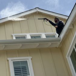 Warrior Window and Gutter Cleaning - Facade wash on a multi-story residential home.