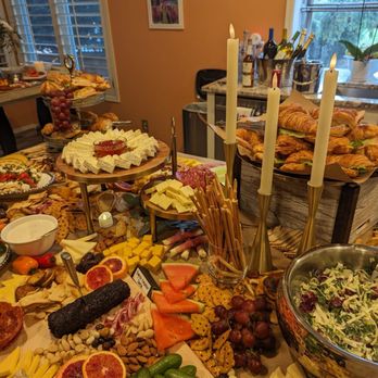 Artful Bites Design - Amazing different levels so guests can see all of the food selections - Caterers Near Me