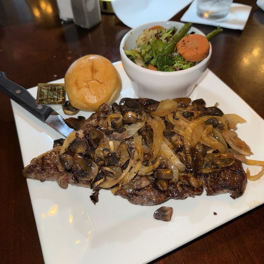 Gatsby's Saloon - Ribeye with onions and mushrooms - Seafood Near Me - Bay City, Michigan Gatsby's Saloon - Ribeye with onions and mushrooms - Seafood Near Me - Bay City, Michigan
